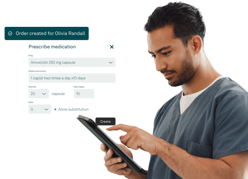 Healthcare provider using a tablet to manage e-prescriptions and patient history with EHR software.
