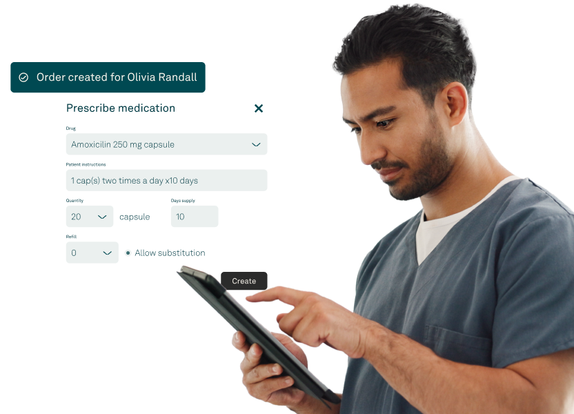 Healthcare provider using a tablet to manage e-prescriptions and patient history with EHR software.